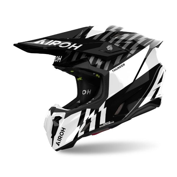 Airoh Twist 3 Thunder Black/White Gloss MX Helmet featuring a sleek, aerodynamic design with bold black and white graphics.