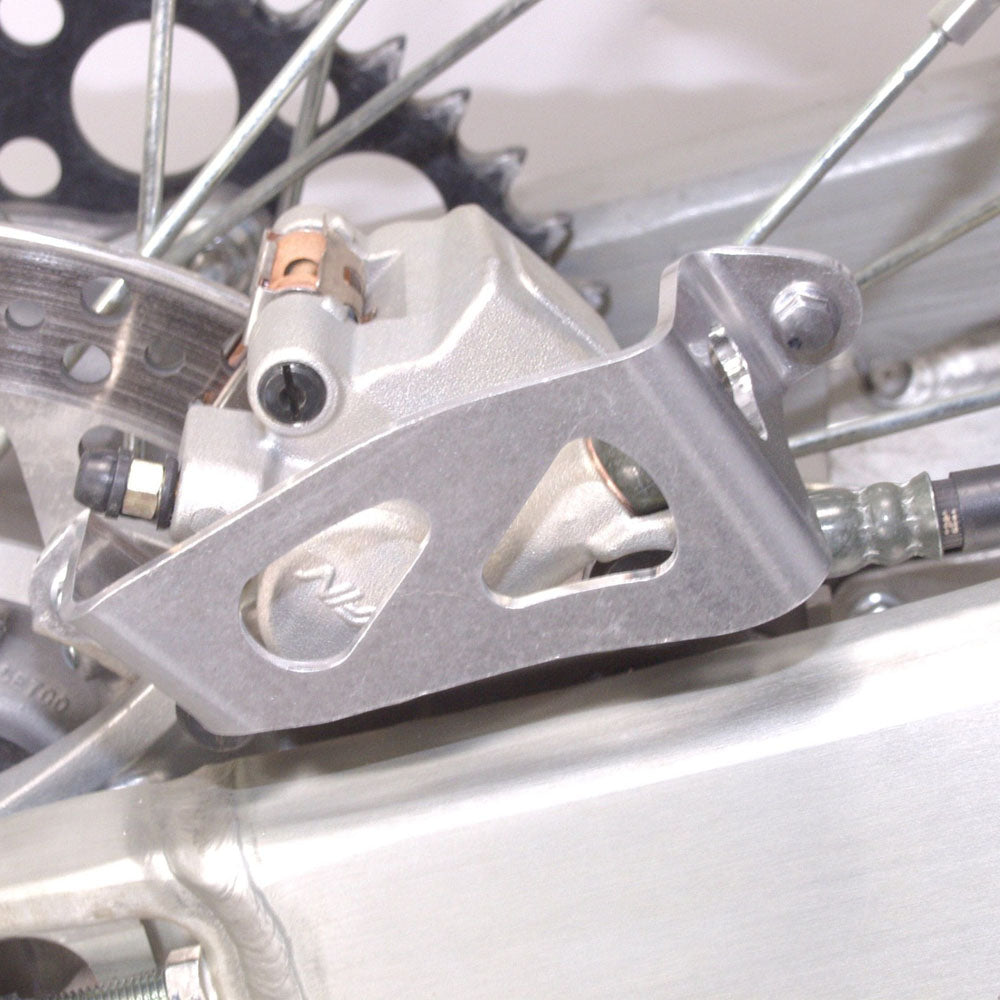 WORKS CONNECTION REAR BRAKE CALIPER GUARD YAMAHA YZ125/250 06-21, YZ250/450F 06-20, YZ250FX 15-21, YZ450FX 16-20, WR250F 06-23, WR450F 06-25