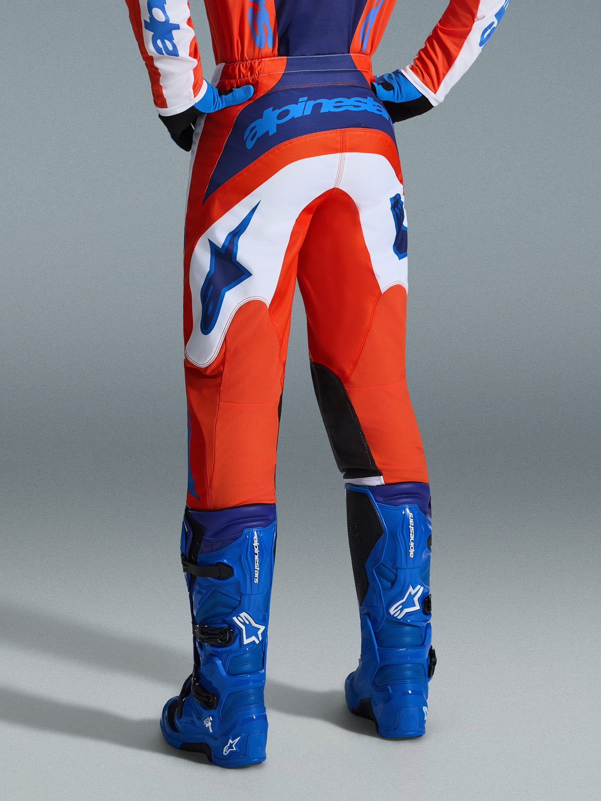 FLUID GRID PANTS - ORANGE/UCLA BLUE